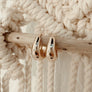 Megen Gabrielle Jewelry | swell tapper hoops. huggie earrings. minimal huggie earrings. huggie earrings with charms. 14k gold fill huggie earrings. tapper hoops. clicker hoop. huggie earrings. 14k gold fill earrings. huggie hoop earrings, 14k gold fill huggie hoop earrings. gold hoops, small business gold hoops, 14K hoops