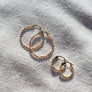Megen Gabrielle Jewelry | huggie hoops. huggie earrings. minimal huggie earrings. huggie earrings with charms. 14k gold fill huggie earrings. CZ diamond huggies, diamond hoops, dot huggies, beaded hoop, beaded tiny hoop, tiny hoops, gold hoops, circle charm huggie earrings, circle dangle charm huggie earrings. 14k gold fill earrings. huggie hoop earrings, 14k gol