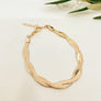 Megen Gabrielle Jewelry | 18K gold fill. gold fill. gold filled. Gold filled bracelet. 18K gold fill herringbone bracelet. braided herringbone bracelet. gold herringbone bracelet. women's herringbone bracelet. Herringbone bracelet stack. herringbone bracelet mens. herringbone bracelet gold.