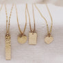 Megen Gabrielle Jewelry | rectangle layering necklace 14k gold fill layering necklace, necklace with rectangle. necklace with shape. 14k gold fill rectangle necklace. geometric necklace. hammered gold rectangle necklace. necklace with texture. 14K gold fill necklaces.  Rectanlge pendant necklace. horizontal necklace pendant. vertical rectangle pendant necklace. long rectangle pendant necklace