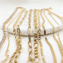Megen Gabrielle Jewelry | 18K gold filled bracelets. 18k gold filled. gold filled bracelets. gold chains. gold bracelet chain,. Gold bracelet. gold bracelets for women. gold chains for women. vintage gold bracelet. gold bracelettes for women. gold bracelet for women. 14K gold bracelet. paperclip bracelet. herringbone bracelet. herringbone chain.