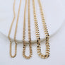 Megen Gabrielle Jewelry | Curb Chain necklace. gold fill necklace, 18k gold fill necklace, gold filled necklace, 18k gold fill necklace, Curb chain 18k gold fill. curb chain 14k gold fill. curb chain necklace. cuban chain necklace. curb chain necklace gold. Cuban chain necklace. womens gold chain necklace. Thick curb chain necklace. Thin curb chain necklace. Thick cuban chain necklace. thin cuban chain necklace.
