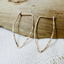 Megen Gabrielle Jewelry | Pointed Oval Hoop Earrings. Classic hoop earrings with closure, shaped in a pointed oval shape in 14K gold fill. 14K gold filled hoop earrings, pointed hoop earrings, classic hoop earrings, hoop earrings, gold hoop earrings