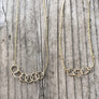 Megen Gabrielle Jewelry | circles necklace, chain and pendaendt circle necklace. 14k gold fill necklace. gold necklace. family necklace. loved ones necklace. necklace. significant other necklace