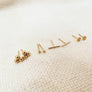 Megen Gabrielle Jewelry | 14K gold fill stud earrings. Three ball gold fill stud earrings. single ball stud earrings. gold ball stud earrings. gold bar stud earrings, gold disk stud earrings. 14k gold fill stud earrings. gold filled stud earrings. gold stud earrings. simple gold stud earrings. gold studs. gold stud earrings for women. gold studs for women.