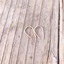 Megen Gabrielle Jewelry | 14K gold fill earrings. Sterling silver earrings. 14k rose gold filled earrings. gold filled earrings, gold fill earrings, arch shapped earrings. arch shaped gold earrings. hook shaped earrings. 14k gold filled hook earrings. small hook earrings. small arch earrings