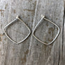 Megen Gabrielle Jewelry | Geometric diamond shaped hoop earrings. diamond shaped hoop earrings. 14k gold fill hoop earrings, 14k rose gold fill earrings, sterling silver earrings. geometric gold earrings, geometric silver earrings, geometric rose gold earrings. minimalist geometric earrings. geometric gold earrings hoop. geometric hoops gold. diamond shaped earrings. silver diamond shaped earrings. rhombus shaped earrings. diamond earrings.