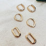 Megen Gabrielle Jewelry | Huggie earrings. 14K gold fill huggie earrings. 14K gold fill earrings. petal shapped huggie earrings. delicate huggie earrings. gold filled huggies. gold filled huggie earrings.