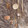 Megen Gabrielle Jewelry | 14K gold fill shine half moon necklace. 14k gold fill jewelry. 14k gold fill necklace. half moon necklace. gold half moon necklace, gold moon necklace, womens 14k gold fill necklace. gold half moon necklace for women. gold half moon necklace for ladies, moon necklace gold. womens moon gold necklace. 14k gold fill jewelry for women. gold filled jewelry.
