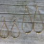 Megen Gabrielle Jewelry | 14k gold fill earrings. gold filled earrings. gold earrings. tear drop shaped earrings. gold tear drop shaped earrings. 14k gold filled drop shaped earrings. 14k gold fill drop earrings, drop earrings. 14K gold fill jewelry. 14K gold fill beaded earrings. gold bead earrings. 14K gold filled bead earrings.