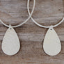 Megen Gabrielle Jewelry | 14k gold fill earrings, 14k gold fill jewelry for women. gold filled earrings. gold filled jewelry for women. 14k gold fill hoop earrings. Gold hoop earrings hammered tear drop earrings. gold tear drop hoop earrings. gold hammered tear drop earrings. earrings with texture. hoops with texture. womens tear drop hoop earrings.