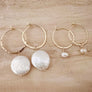 Megen Gabrielle Jewelry | 14k gold fill jewelry. 14k gold fill earrings, pearl earrings. gold and pearl earrings. dangle pearl earrings. coin pearl earrings. gold filled earrings, gold earrings. pearl earrings. pearl hoop earrings
