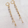 Megen Gabrielle Jewelry Studios | iolite earrings. iolite gemstone earrings. Iolite and moonstone dangle earrings. drop earrings. elegant earrings. 14K gold fill earrings. drop dangle earrings. moonstone earrings.