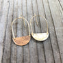 Megen Gabrielle Jewelry | 14k gold filled earrings. 14k gold fill earrings. gold earrings for women, gold earrings for ladies. gold filled jewelry. gold fill earrings. gold fill half moon earrings. drop hoop gold earrings. gold half moon drop hoop earrings. half moon hammered gold earrings. gold geometric shape earrings. gold geometric hammered hoop earrings. flat hammered gold hoop earrings. gold half moon hoop earrings.