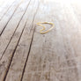 Wave shaped 14k gold fill stacking ring. Dainty ring style.