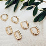 Megen Gabrielle Jewelry | Huggie earrings. 14K gold fill huggie earrings. 14K gold fill earrings. petal shapped huggie earrings. delicate huggie earrings. gold filled huggies. gold filled huggie earrings.