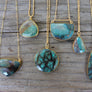 chrysocolla necklace, circle shape, tear drop shape, triangle shape, and organic shaped chrysocolla. Megen Gabrielle Jewlery Studios, Handmade, real gemstone