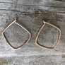 Megen Gabrielle Jewelry | Geometric diamond shaped hoop earrings. diamond shaped hoop earrings. 14k gold fill hoop earrings, 14k rose gold fill earrings, sterling silver earrings. geometric gold earrings, geometric silver earrings, geometric rose gold earrings. minimalist geometric earrings. geometric gold earrings hoop. geometric hoops gold. diamond shaped earrings. silver diamond shaped earrings. rhombus shaped earrings. diamond earrings.