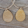Megen Gabrielle Jewelry | 14k gold fill earrings, 14k gold fill jewelry for women. gold filled earrings. gold filled jewelry for women. 14k gold fill hoop earrings. Gold hoop earrings hammered tear drop earrings. gold tear drop hoop earrings. gold hammered tear drop earrings. earrings with texture. hoops with texture. womens tear drop hoop earrings.