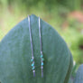 Megen Gabrielle Jewelry | stick dangle earrings with turquoise beads. turquoise bead earrings. simple earrings. dainty turquoise earrings. 14k gold fill earrings. sterling silver earrings.