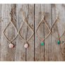 Megen Gabrielle Jewelry | Diamond shaped hoop earrings in 14k gold fill with Chrysocolla or Peachy Pink Rhodonite drop stone. diamond shaped hoop drop earrings for women. 14k gold fill earrings. gold earrings with stone drop. gold fill earrings for women. drop hoop earrings. drop hoop earrings with stone drop for women. gold hoop earrings drop hoop. gold filled stone drop earrings. gold stone drop earrings.