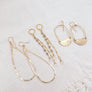 Megen Gabrielle Jewelry Studios | iolite earrings. iolite gemstone earrings. Iolite and moonstone dangle earrings. drop earrings. elegant earrings. 14K gold fill earrings. drop dangle earrings. moonstone earrings.