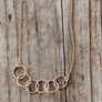 Megen Gabrielle Jewelry | circles necklace, chain and pendaendt circle necklace. 14k gold fill necklace. gold necklace. family necklace. loved ones necklace. necklace. significant other necklace