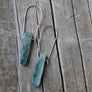 Megen Gabrielle Jewelry | Minimal gemstone hoop earrings. U shaped gemstone hoop earrings. arch shaped hoop earrings. gemstone arch hoop earrings. gemstone arc hoop earrings. gemstone earrings. gemstone hoops. natural gemstone hoop earrings. natural gemstone hoop earrings with arch. 14k gold fill gemstone earrings. sterling silver earrings. arch hoop earrings. arched earrings. gold fill arch earrings.