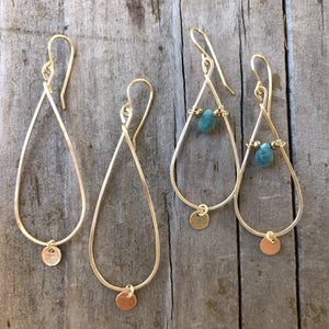Megen Gabrielle Jewelry | teardrop-shaped hoop with gold disk drop and another pair of hoops wire wrapped with a chrysocolla stone and has a little circle drop as-well.