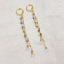 Megen Gabrielle Jewelry Studios | iolite earrings. iolite gemstone earrings. Iolite and moonstone dangle earrings. drop earrings. elegant earrings. 14K gold fill earrings. drop dangle earrings. moonstone earrings.