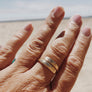 Megen Gabrielle Jewelry | 14k gold fill jewelry. 14k gold filled jewelry. 14k gold fill rings. 14k gold filled ring. wrap ring. hammered wrap ring. wrap ring for women. gold wrap ring for women. gold wrap ring for ladies. silver wrap ring for women, silver wrap ring for ladies. womens thick wrap ring. quiality womens ring. tough ring for women. tough ring for ladies. quality sturdy ring for women