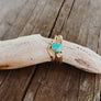 Megen Gabrielle Jewelry | The Point Ring. Point shaped geometric ring, 14K gold fill. displayed with other stacking rings.