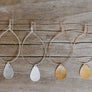 Megen Gabrielle Jewelry | 14k gold fill earrings, 14k gold fill jewelry for women. gold filled earrings. gold filled jewelry for women. 14k gold fill hoop earrings. Gold hoop earrings hammered tear drop earrings. gold tear drop hoop earrings. gold hammered tear drop earrings. earrings with texture. hoops with texture. womens tear drop hoop earrings.