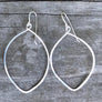 Megen Gabrielle Jewelry | 14K gold fill earrings. Sterling Silver Earrings. 14K rose gold filled earrings. Leaf shaped earrings. Natural Earrings. Silver earrings, gold earrings. hoop earrings. natural shaped hoop earrings. simple earrings.