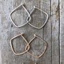 Megen Gabrielle Jewelry | Geometric diamond shaped hoop earrings. diamond shaped hoop earrings. 14k gold fill hoop earrings, 14k rose gold fill earrings, sterling silver earrings. geometric gold earrings, geometric silver earrings, geometric rose gold earrings. minimalist geometric earrings. geometric gold earrings hoop. geometric hoops gold. diamond shaped earrings. silver diamond shaped earrings. rhombus shaped earrings. diamond earrings.
