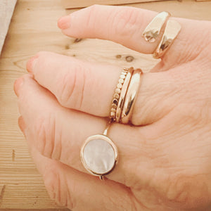 Megen Gabrielle Jewelry | 14k gold fill jewelry. 14k gold filled jewelry. 14k gold fill rings. 14k gold filled ring. wrap ring. hammered wrap ring. wrap ring for women. gold wrap ring for women. gold wrap ring for ladies. silver wrap ring for women, silver wrap ring for ladies. womens thick wrap ring. quiality womens ring. tough ring for women. tough ring for ladies, pinkie ring