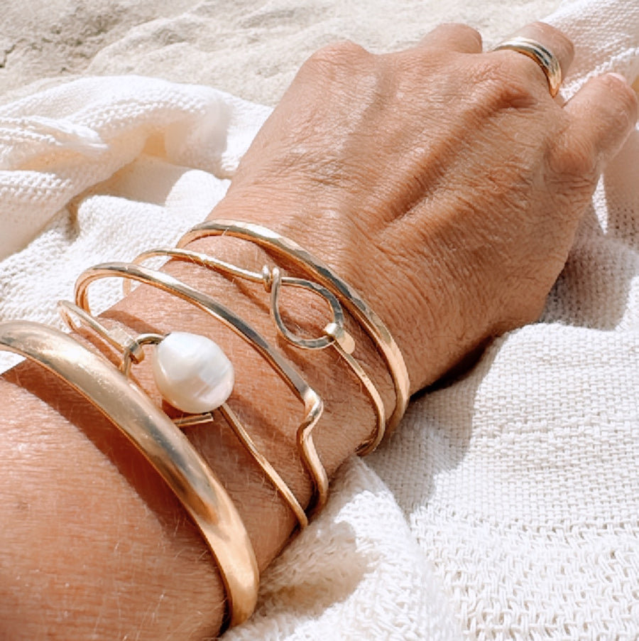 Megen Gabrielle Jewelry | 14k gold fill jewelry. 14k gold fill bangle, pearl bangle, pearl cuff,  gold and pearl jewelry. Gold bangles, hammered bangle, handmade gold bangle