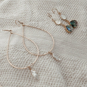 Megen Gabrielle Jewelry | 14k gold fill jewelry. 14k gold fill earrings, pearl earrings. gold and pearl earrings. dangle pearl earrings. coin pearl earrings. gold filled earrings, gold earrings. pearl earrings. pearl hoop earrings for women. pearl drop hoop earrings for women. 