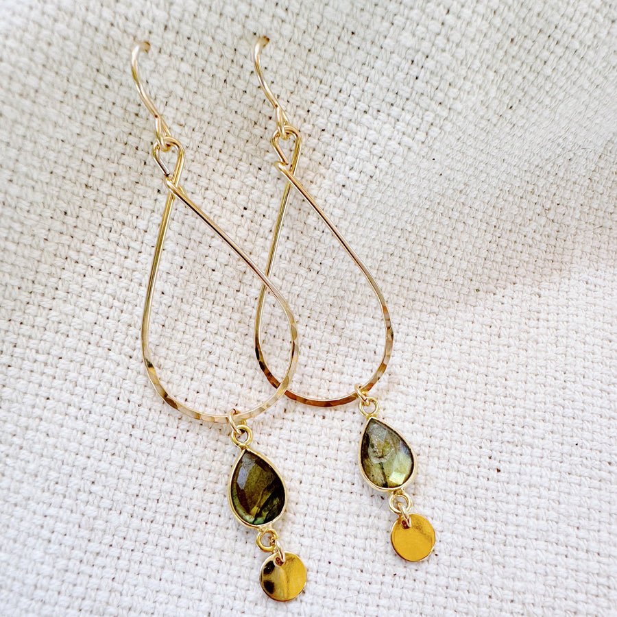 Megen Gabrielle Jewelry | labradorite jewelry, 14k gold fill jewelry. dangle earrings. 14K gold fill earrings. sparkly earrings. Labradorite stone jewelry, natural stone jewelry. Labradorite drop hoop earrings. labradorite hoop earrings. Gold filled labradorite hoop earrings. gold labradorite hoop earrings. gold earrings with labradorite. 