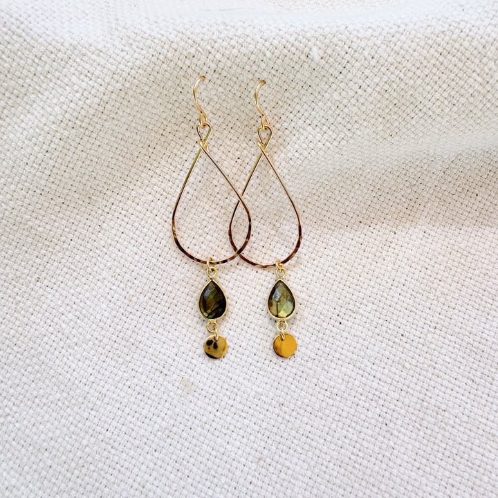 Megen Gabrielle Jewelry | labradorite jewelry, 14k gold fill jewelry. dangle earrings. 14K gold fill earrings. sparkly earrings. Labradorite stone jewelry, natural stone jewelry. Labradorite drop hoop earrings. labradorite hoop earrings. Gold filled labradorite hoop earrings. gold labradorite hoop earrings. gold earrings with labradorite. 