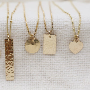 Megen Gabrielle Jewelry | rectangle layering necklace 14k gold fill layering necklace, necklace with rectangle. necklace with shape. 14k gold fill rectangle necklace. geometric necklace. hammered gold rectangle necklace. necklace with texture. 14K gold fill necklaces.  Rectanlge pendant necklace. horizontal necklace pendant. vertical rectangle pendant necklace. long rectangle pendant necklace