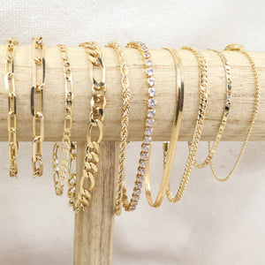 Megen Gabrielle Jewelry | 18K gold filled bracelets. 18k gold filled. gold filled bracelets. gold chains. gold bracelet chain,. Gold bracelet. gold bracelets for women. gold chains for women.  vintage gold bracelet.  gold bracelettes for women. gold bracelet for women. 14K gold bracelet. paperclip bracelet. herringbone bracelet. herringbone chain. 