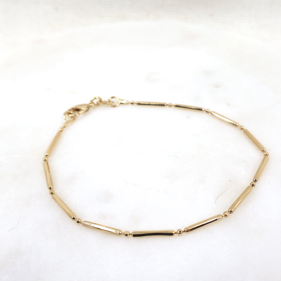 Megen Gabrielle Jewelry | 18K gold filled bracelets. 18k gold filled. gold filled bracelets. gold chains. gold bracelet chain,. Gold bracelet. gold bracelets for women. gold chains for women.  vintage gold bracelet.  gold bracelettes for women. gold bracelet for women. 14K gold bracelet. paperclip bracelet. herringbone bracelet. herringbone chain. 