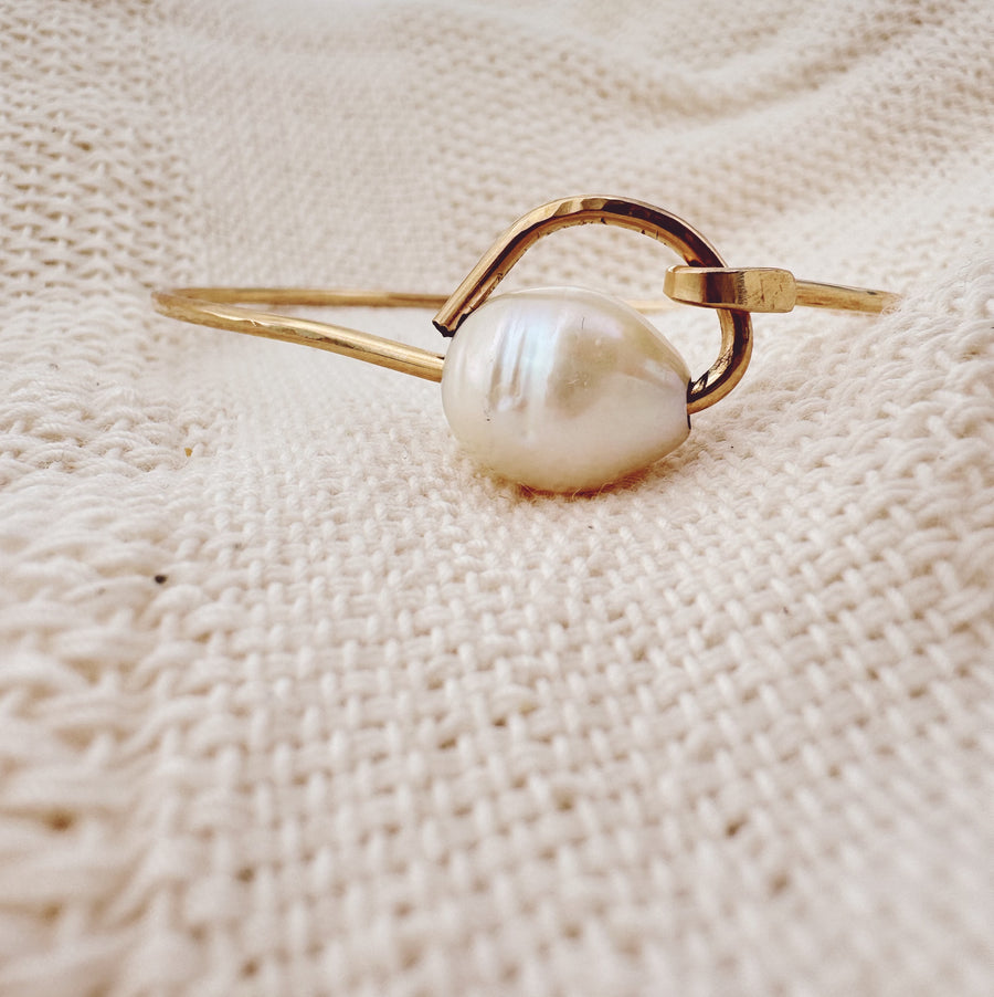 Megen Gabrielle Jewelry | 14k gold fill jewelry. 14k gold fill bangle, pearl bangle, pearl cuff,  gold and pearl jewelry. Gold bangles, hammered bangle, handmade gold bangle