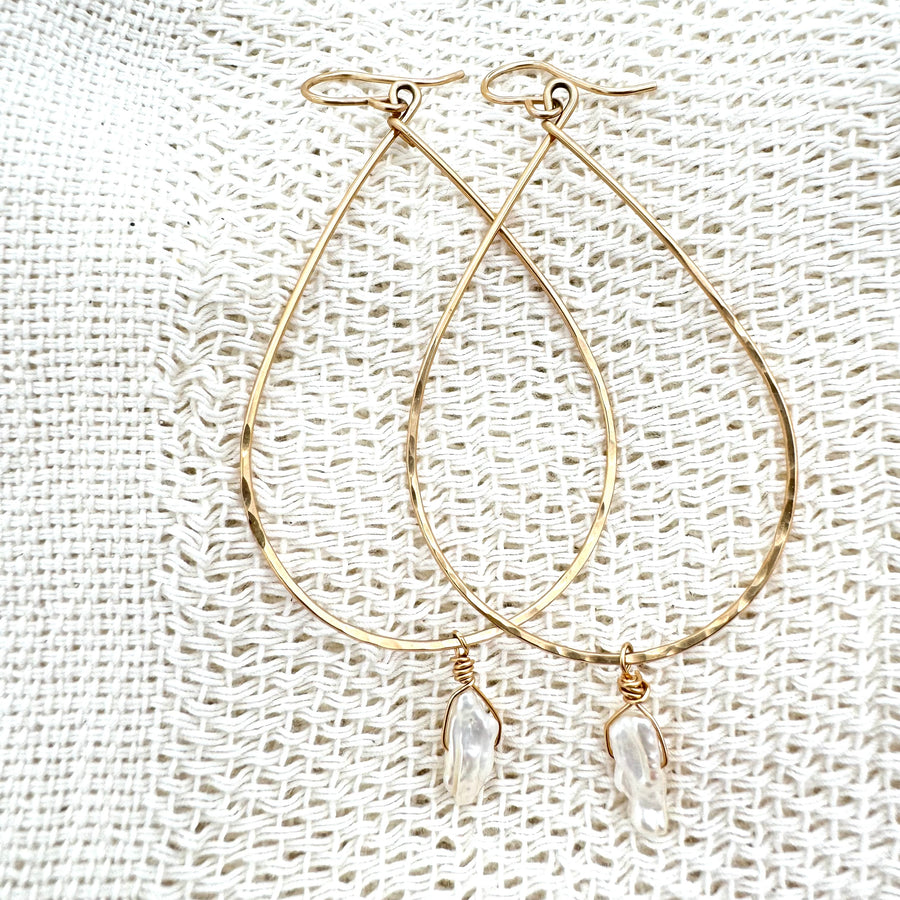 Megen Gabrielle Jewelry | 14k gold fill jewelry. 14k gold fill earrings, pearl earrings. gold and pearl earrings. dangle pearl earrings. coin pearl earrings. gold filled earrings, gold earrings. pearl earrings. pearl hoop earrings for women. pearl drop hoop earrings for women. 