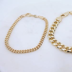 Megen Gabrielle Jewelry | 18k gold fill bracelet, gold fill bracelet, gold filled bracelet. women's gold bracelet. 18k gold filled bracelet cuban. 18k gold filled bracelet curb chain. womens gold bracelet. mens gold bracelet. gold bracelet for ladies. curb chain bracelet. Cuban chain bracelet. curb chain vs cuban link. mens gold chain. mens cuban chain bracelet. womens cuban chain bracelet.