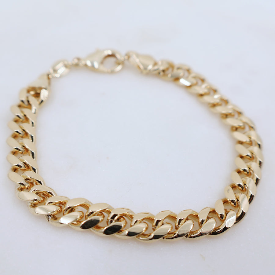 Megen Gabrielle Jewelry | 18k gold fill bracelet, gold fill bracelet, gold filled bracelet. women's gold bracelet. 18k gold filled bracelet cuban. 18k gold filled bracelet curb chain. womens gold bracelet. mens gold bracelet. gold bracelet for ladies. curb chain bracelet. Cuban chain bracelet. curb chain vs cuban link. mens gold chain. mens cuban chain bracelet. womens cuban chain bracelet.