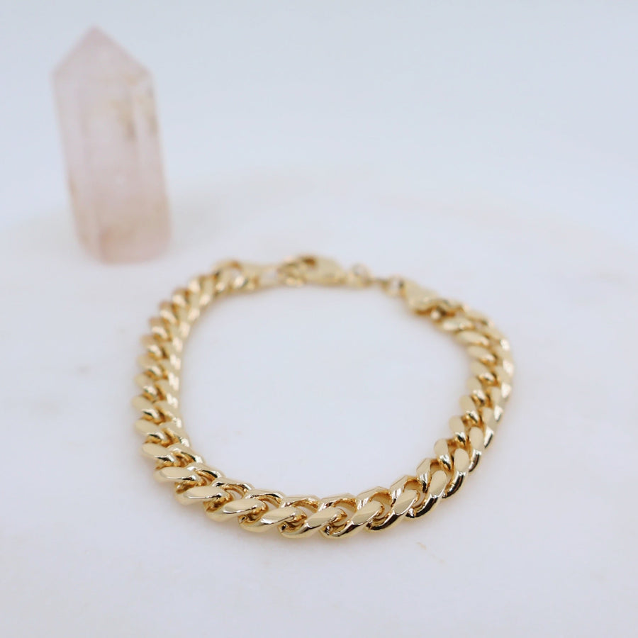 Megen Gabrielle Jewelry | 18k gold fill bracelet, gold fill bracelet, gold filled bracelet. women's gold bracelet. 18k gold filled bracelet cuban. 18k gold filled bracelet curb chain. womens gold bracelet. mens gold bracelet. gold bracelet for ladies. curb chain bracelet. Cuban chain bracelet. curb chain vs cuban link. mens gold chain. mens cuban chain bracelet. womens cuban chain bracelet.