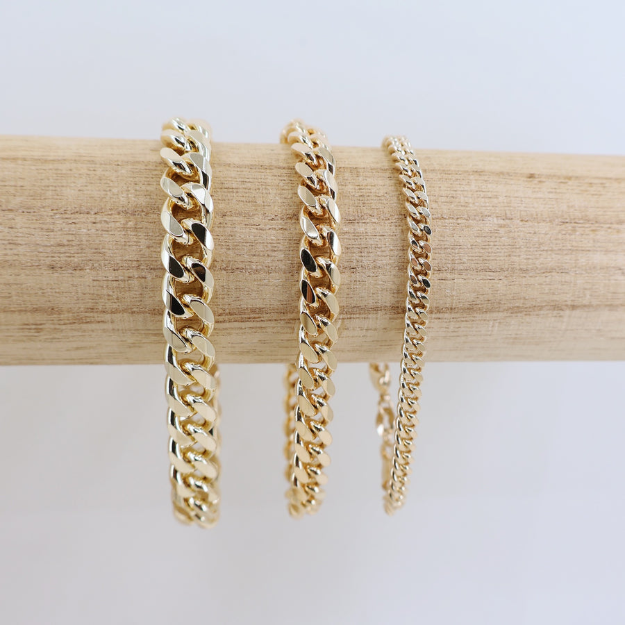 Megen Gabrielle Jewelry | 18k gold fill bracelet, gold fill bracelet, gold filled bracelet. women's gold bracelet. 18k gold filled bracelet cuban. 18k gold filled bracelet curb chain. womens gold bracelet. mens gold bracelet. gold bracelet for ladies. curb chain bracelet. Cuban chain bracelet. curb chain vs cuban link. mens gold chain. mens cuban chain bracelet. womens cuban chain bracelet.