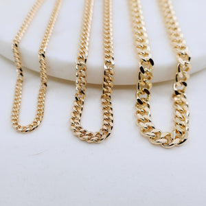 Megen Gabrielle Jewelry | Curb Chain necklace. gold fill necklace, 18k gold fill necklace, gold filled necklace, 18k gold fill necklace, Curb chain 18k gold fill. curb chain 14k gold fill.  curb chain necklace. cuban chain necklace. curb chain necklace gold. Cuban chain necklace. womens gold chain necklace. Thick curb chain necklace. Thin curb chain necklace. Thick cuban chain necklace. thin cuban chain necklace.